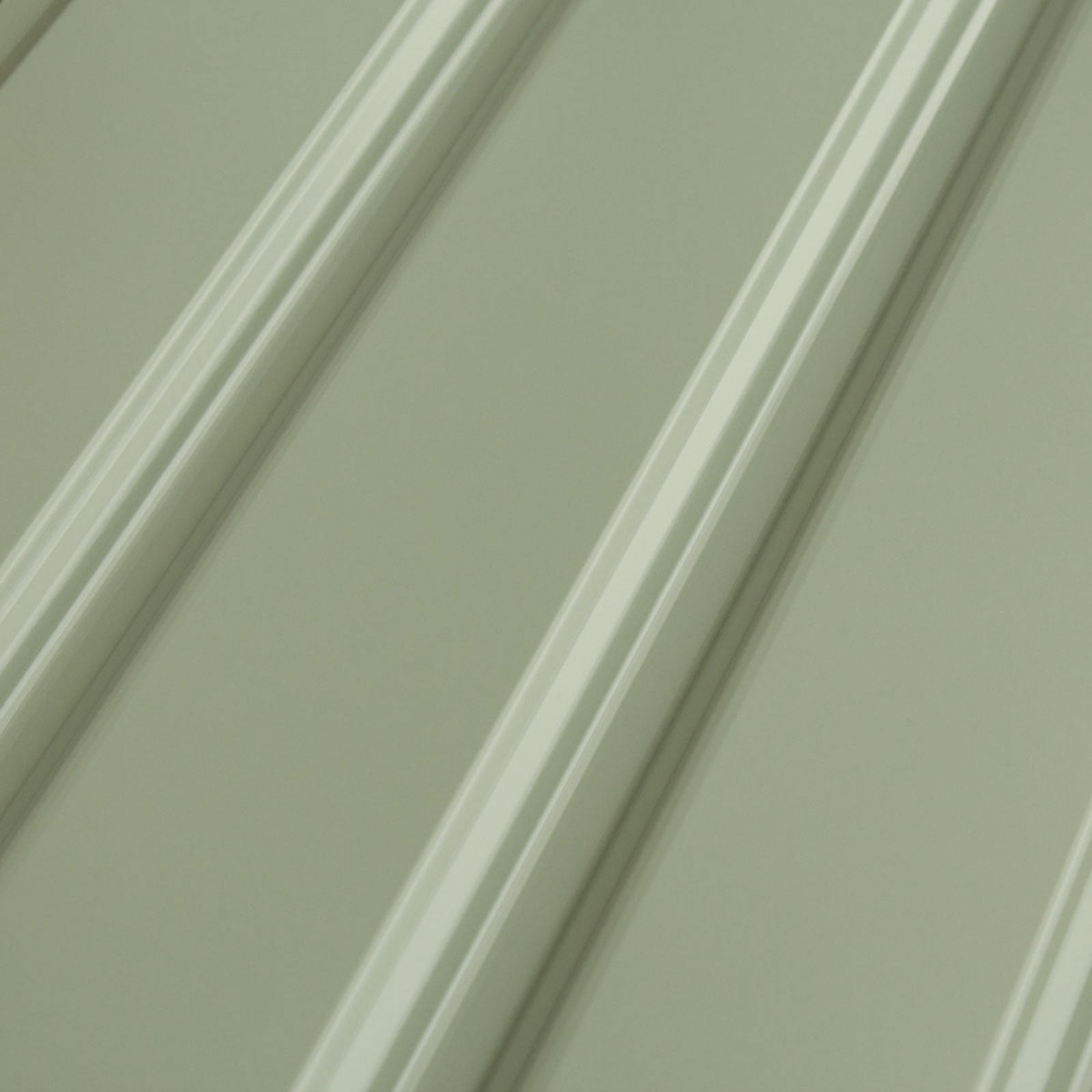 Nahaufnahme von diagonalen, grünen Paneelen mit erhabenen Kanten